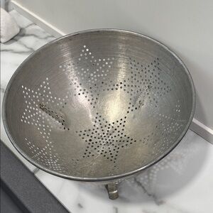 vintage aluminum colander featuring 7 star